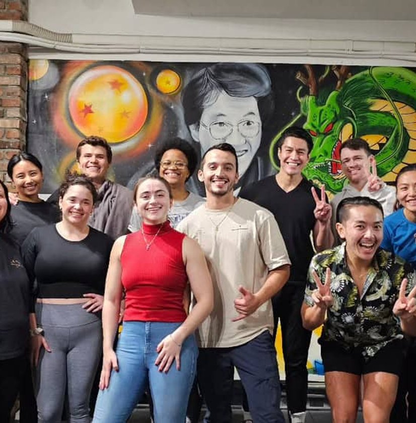 Young Savage fitness team smiling together