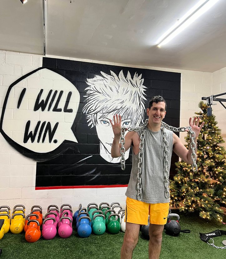 Athlete performing heavy squat in gym